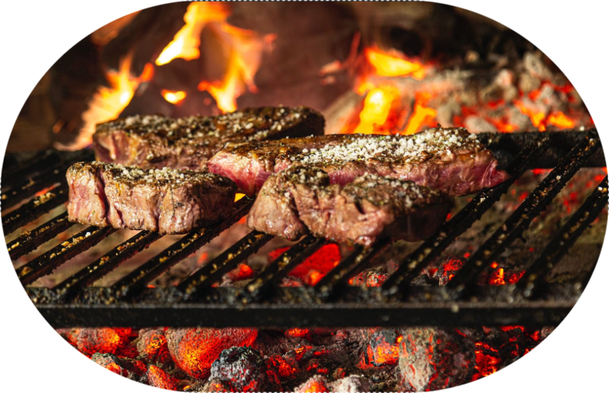 Steak cooking on grill